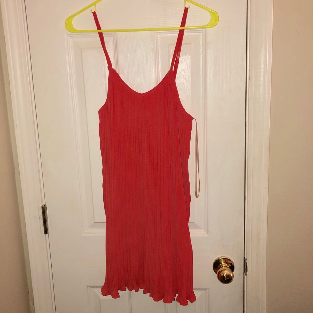 Coral pleated dress